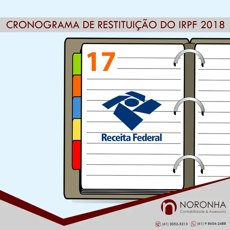 Calendário e extrato bancário sobre a mesa representando o cronograma de restituição do imposto de renda